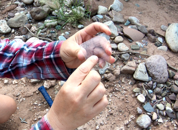 scratched glass from identifying rocks that make sparks