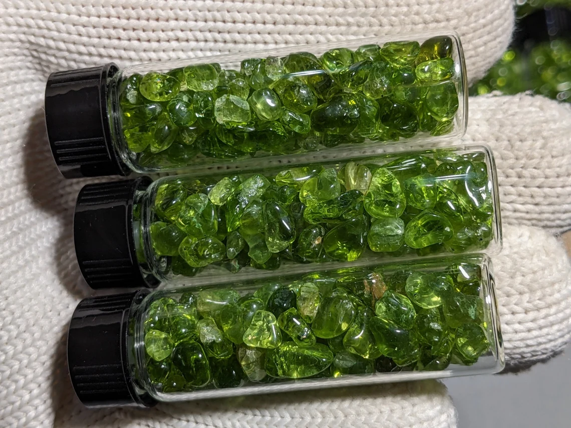 jar of tumbled arizona peridot gemstones for sale