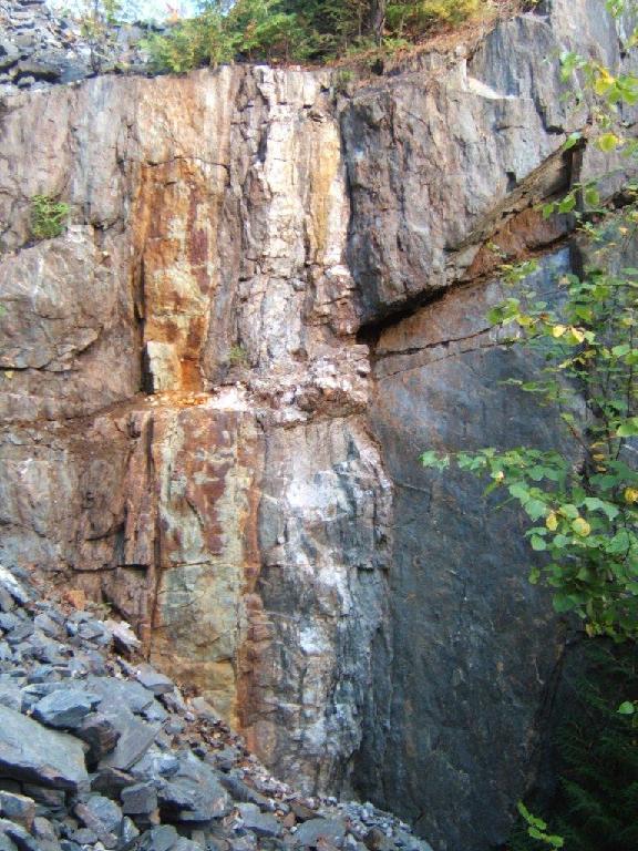 quartz vein stained with rust as an indicator for gold deposit