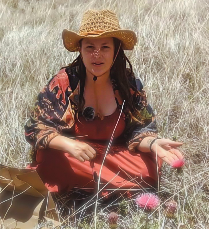 Regina Cal teaching about foraging wild edibles in the Arizona wilderness